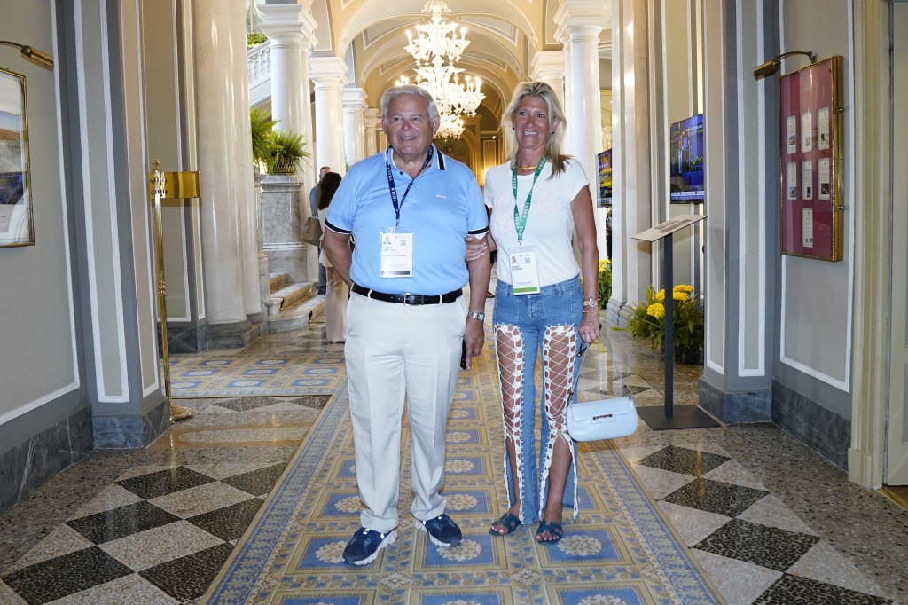 Senator Robert Menendez and Nadine Arslanian in an elaborate hallway in Italy.