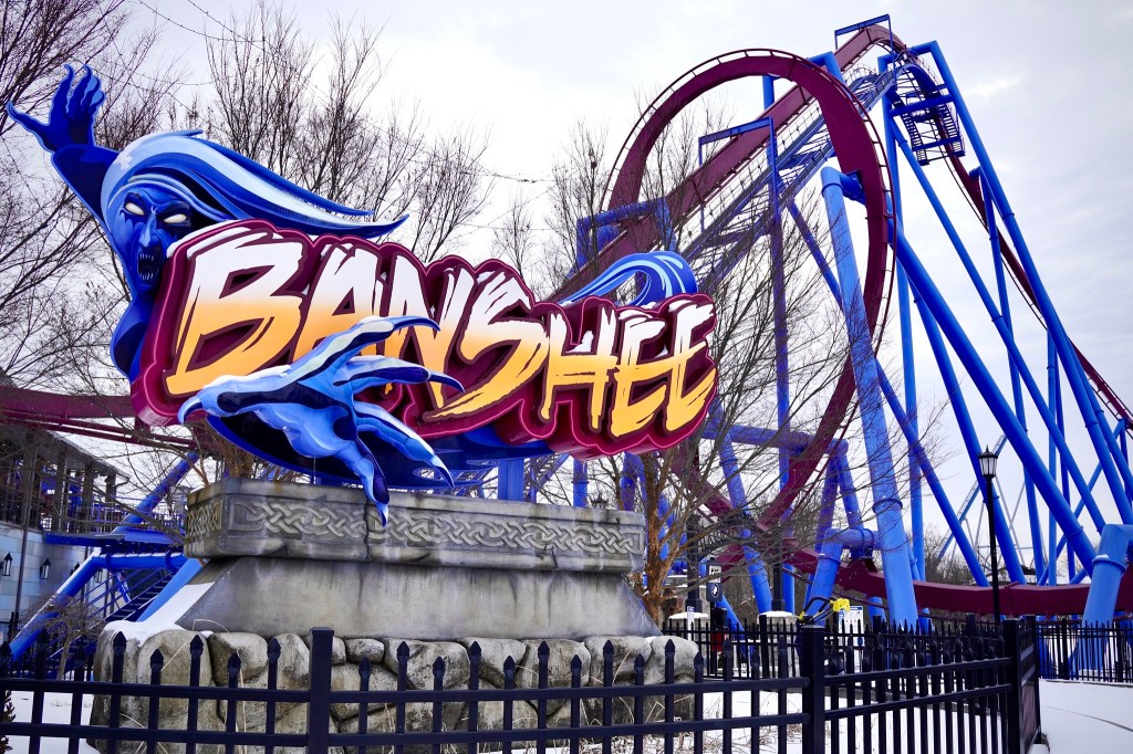 The man dropped his keys while riding the Banshee, an inverted roller coaster where the train dangles from the track, and then went into the restricted area and was struck by the coaster.