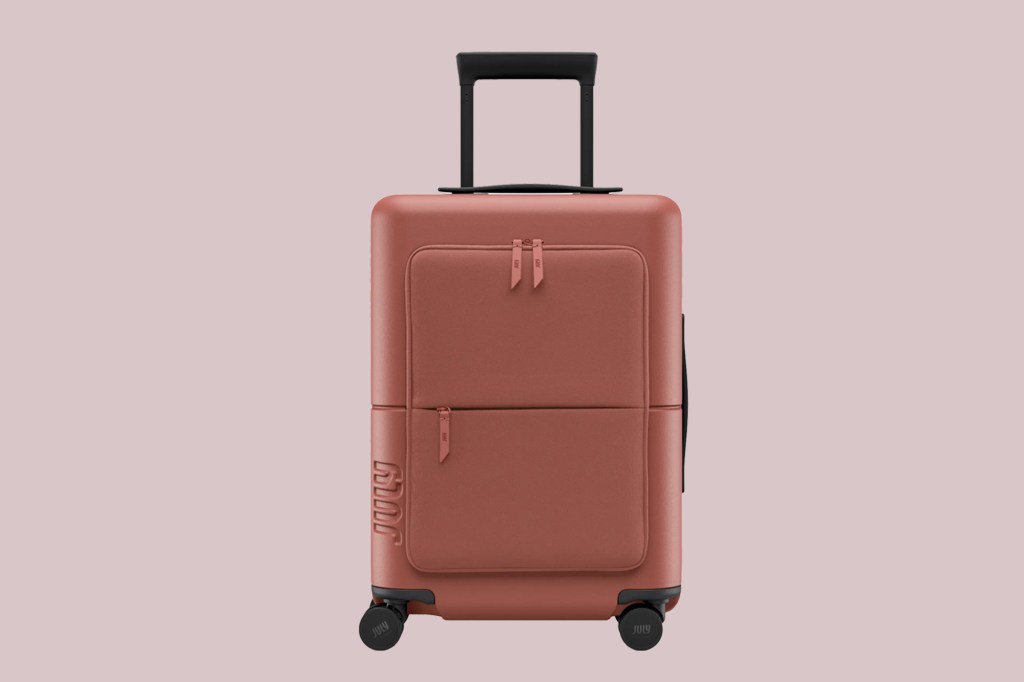 A brown suitcase with wheels