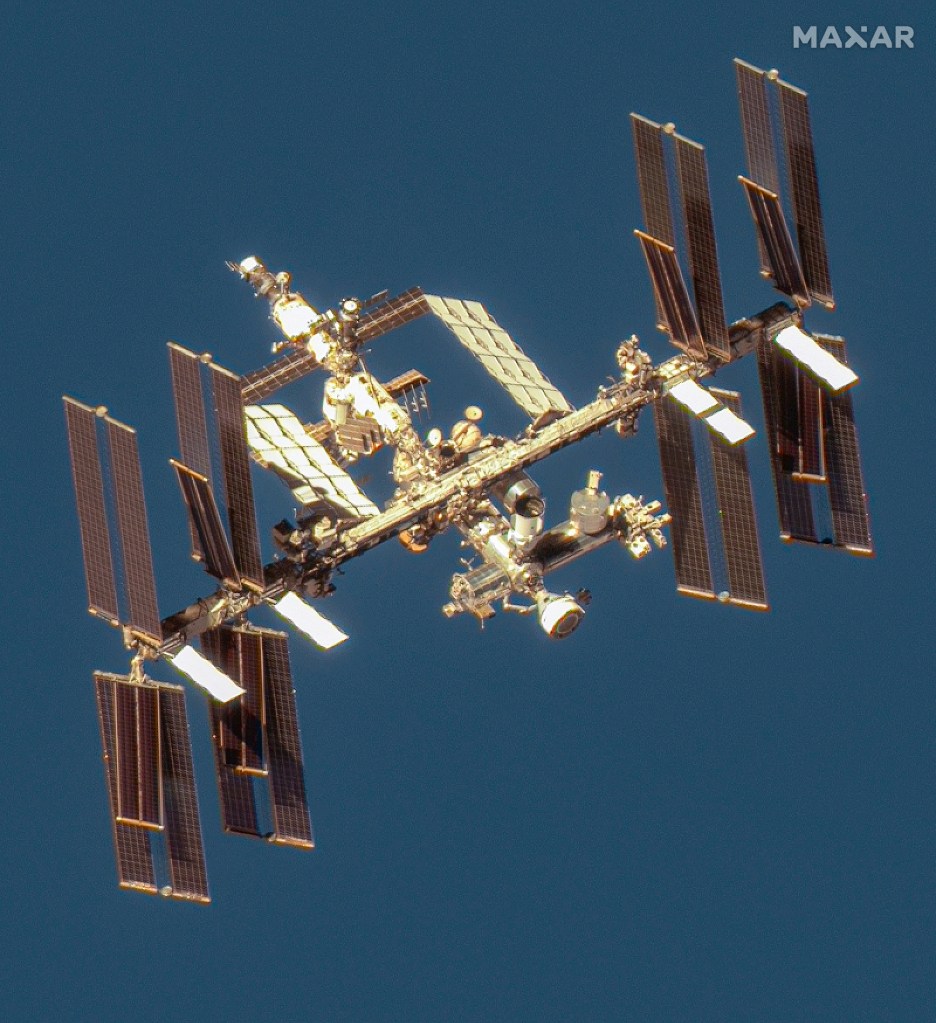 The International Space Station orbiting above Earth.