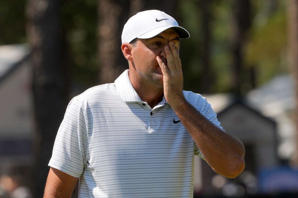 Scottie Scheffler reacts after missing a putt on the second hole during the second round of the U.S. Open