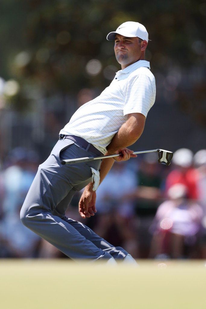  Scottie Scheffler of the United States reacts after a putt on the seventh green during the second round of the 124th U.S. Open at Pinehurst No. 2 on June 13, 2024.