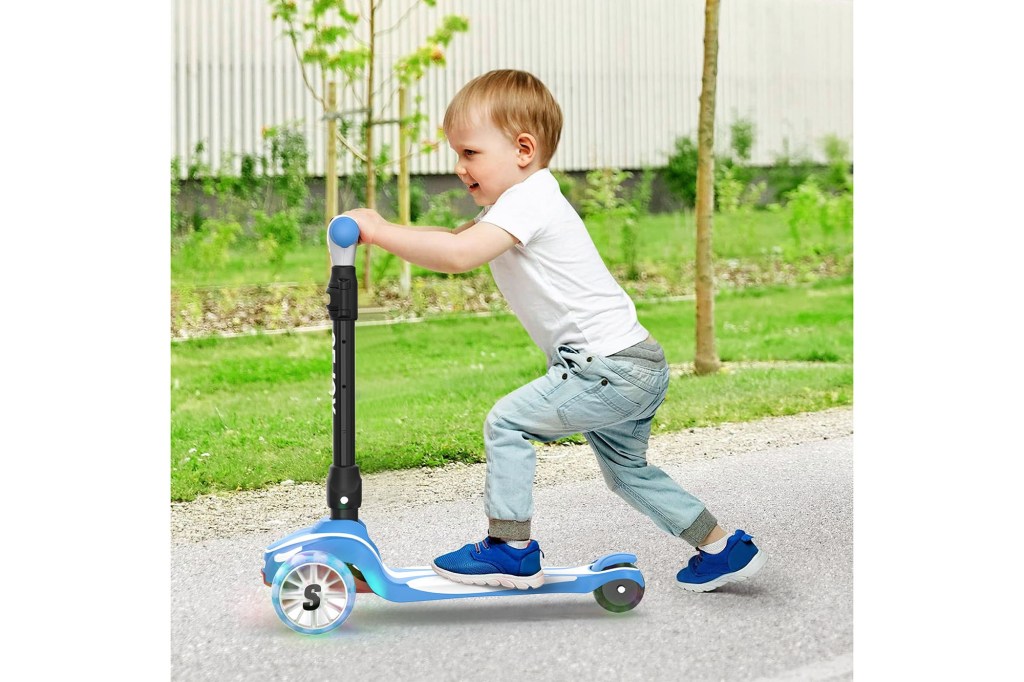 A child riding a scooter