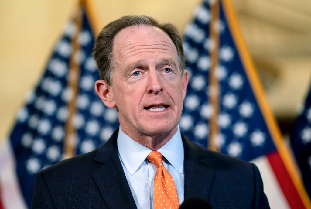 Sen. Pat Toomey, R-Pa., the ranking member of the Senate Banking Committee, tells reporters that Republicans will boycott a vote scheduled for today on confirming President Joe Biden's nominees to the Federal Reserve, including the confirmation of Jerome Powell to a second term as chairman, outside a GOP strategy meeting at the Capitol in Washington, Tuesday, Feb. 15, 2022.