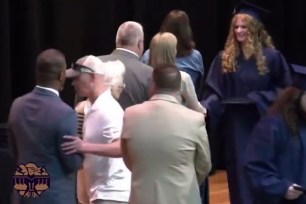 Dad shoves aside superintendent at graduation to stop handshake