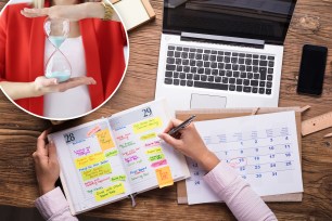 Close-up Of Businesswoman Writing Schedule In Calendar Diary On Desk; Shutterstock ID 621973514; purchase_order: -; job: -; client: -; other: -
