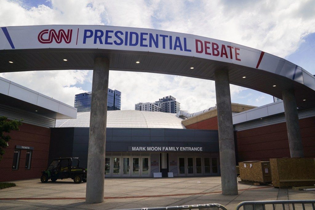 Signs promoting the debate between U.S. President Joe Biden and his rival Former U.S. President Donald Trump are displayed around the venue at CNN Center in Atlanta, Georgia, U.S. June 24, 2024.