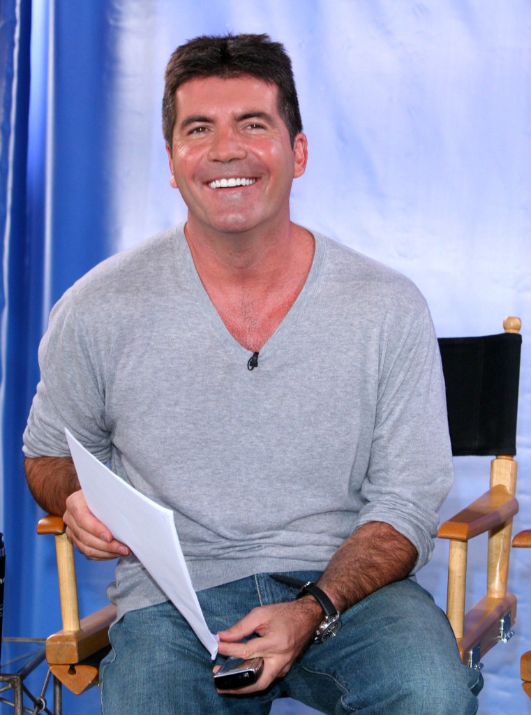 Simon Cowell smiling during an 'America's Got Talent' press conference at NBC Studios in Burbank, California