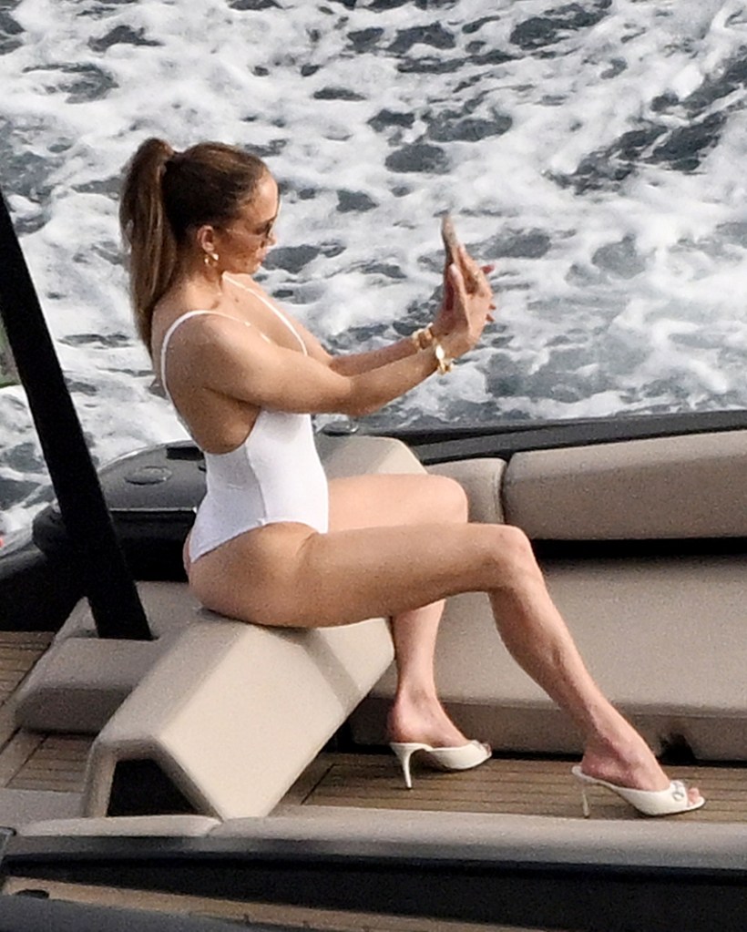 J-Lo taking selfies. 