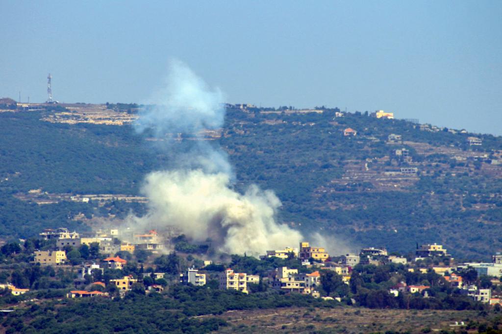 Smoke billows following Israeli bombardment in the village of Shihin in southern Lebanon near the border with Israel.