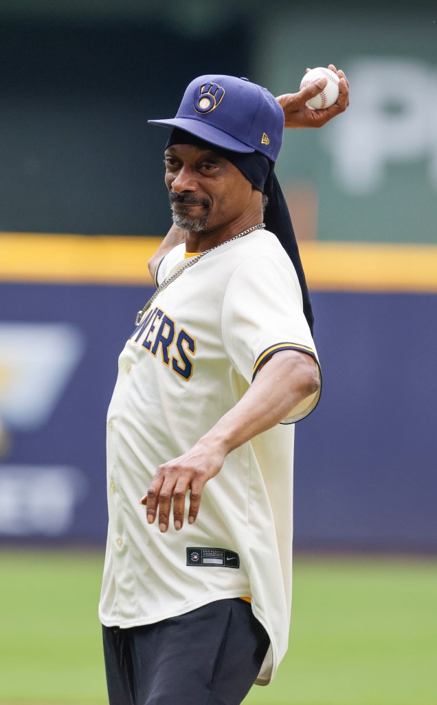Snoop Dogg throws out the first pitch at the Brewers game on Saturday.