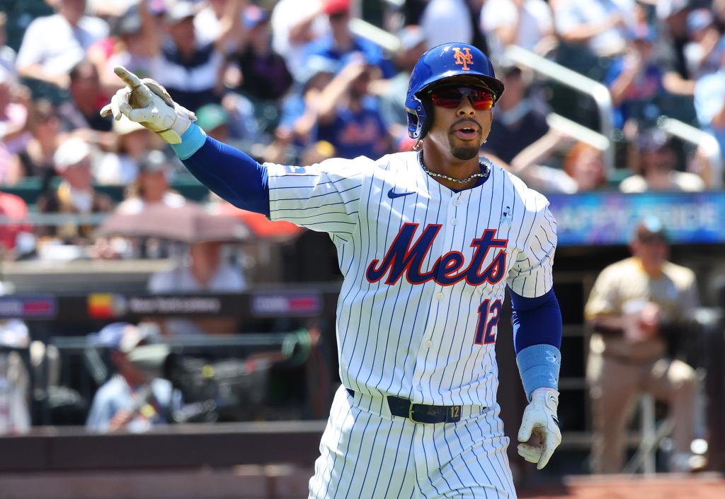 New York Mets shortstop Francisco Lindor hitting a solo home run during the first inning of the game against San Diego Padres at Citi Field, 2024