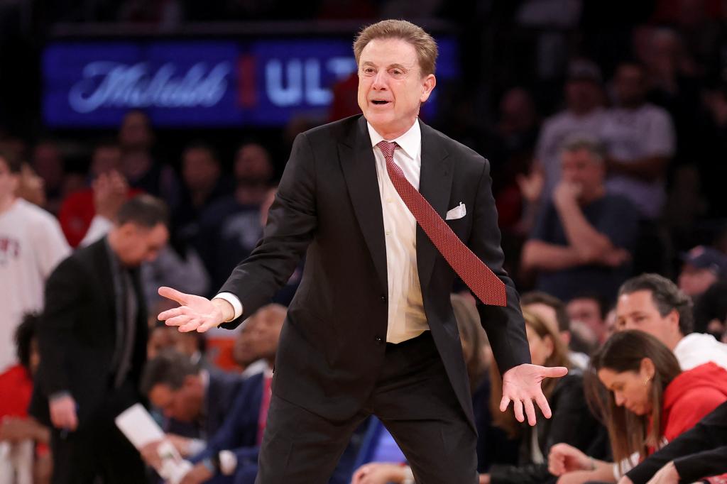Rick Pitino, St. John's Red Storm head coach, coaching against the Connecticut Huskies during the second half of a basketball game at Madison Square Garden