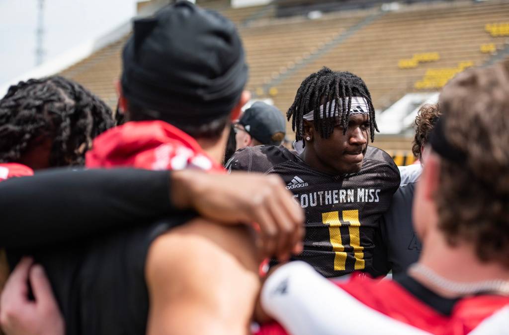 Southern Miss Golden Eagles' cornerback MJ Daniels (11) stands in a huddle after the spring game at the M.M. Roberts Stadium in Hattiesburg, Miss., on Saturday, Apr. 6, 2024. Daniels was shot dead at an apartment complex earlier this week. He was 21 years old.
