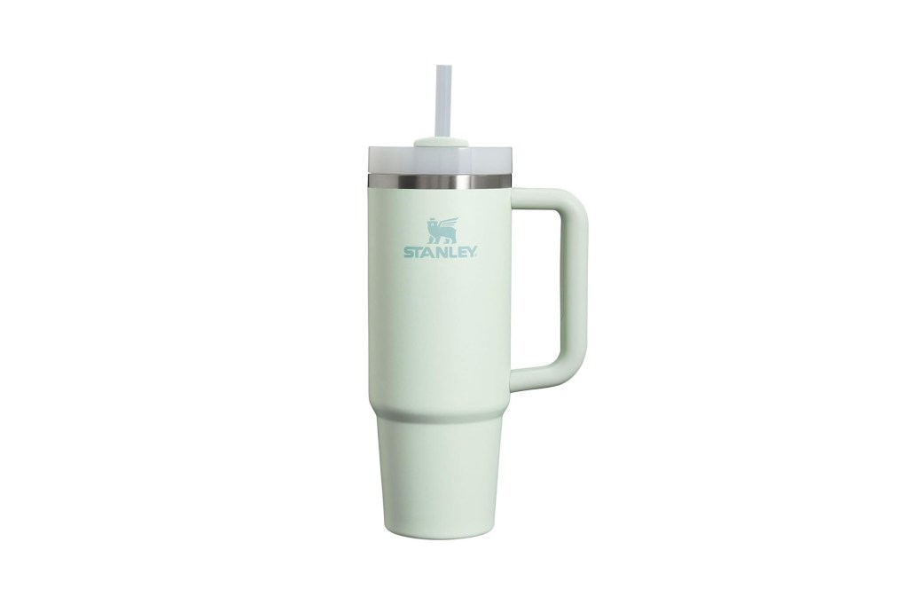 A white mug with a straw