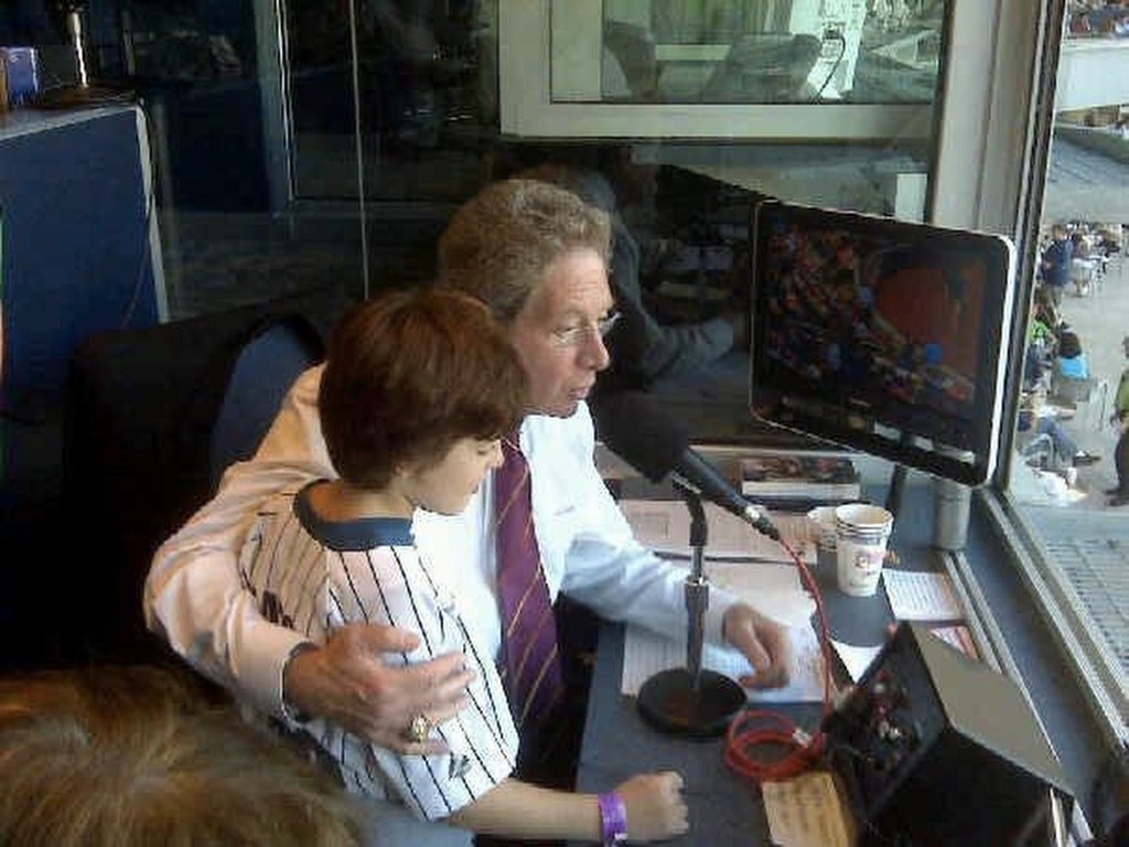 Sterling with son, Brad, in the Yankee announcer's booth.