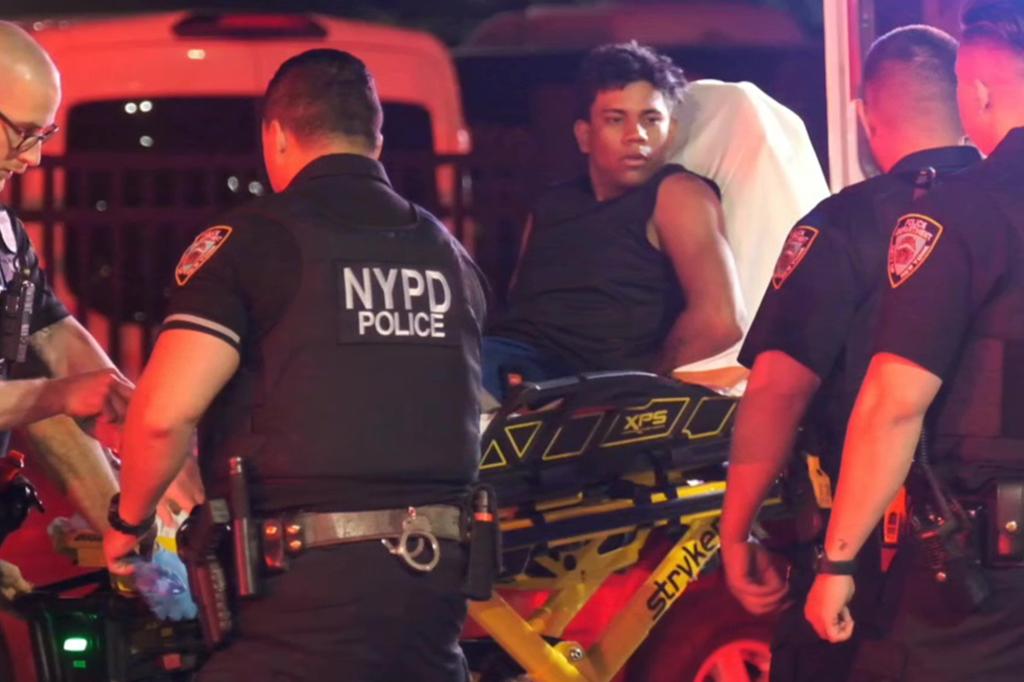 Suspect Bernardo Castro Mata, the Venezuelan migrant accused of shooting two NYPD officers, is wheeled out on a stretcher after the shooting.