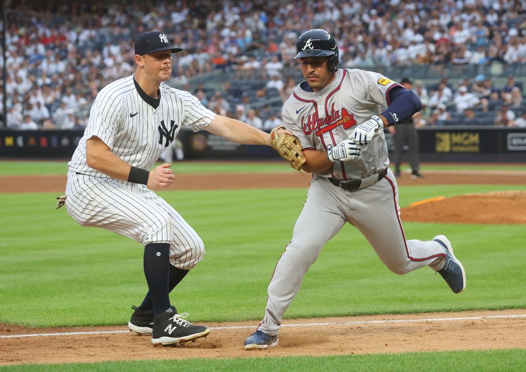 Yankees third base DJ LeMahieu (26) tags out Atlanta Braves outfielder Ramón Laureano (18) at third base during the second inning when the New York Yankees played the Atlanta Braves.