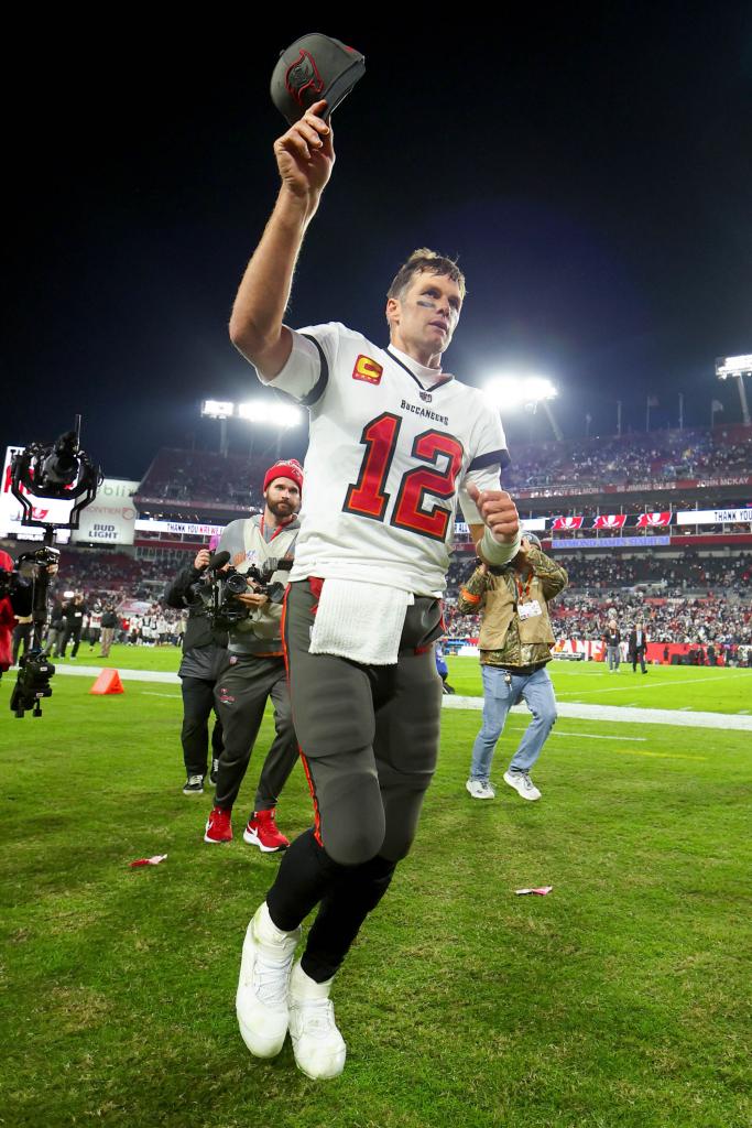 Tom Brady #12 of the Tampa Bay Buccaneers walks off the field after losing to the Dallas Cowboys 31-14 in the NFC Wild Card playoff game at Raymond James Stadium on January 16, 2023 in Tampa, Florida. 