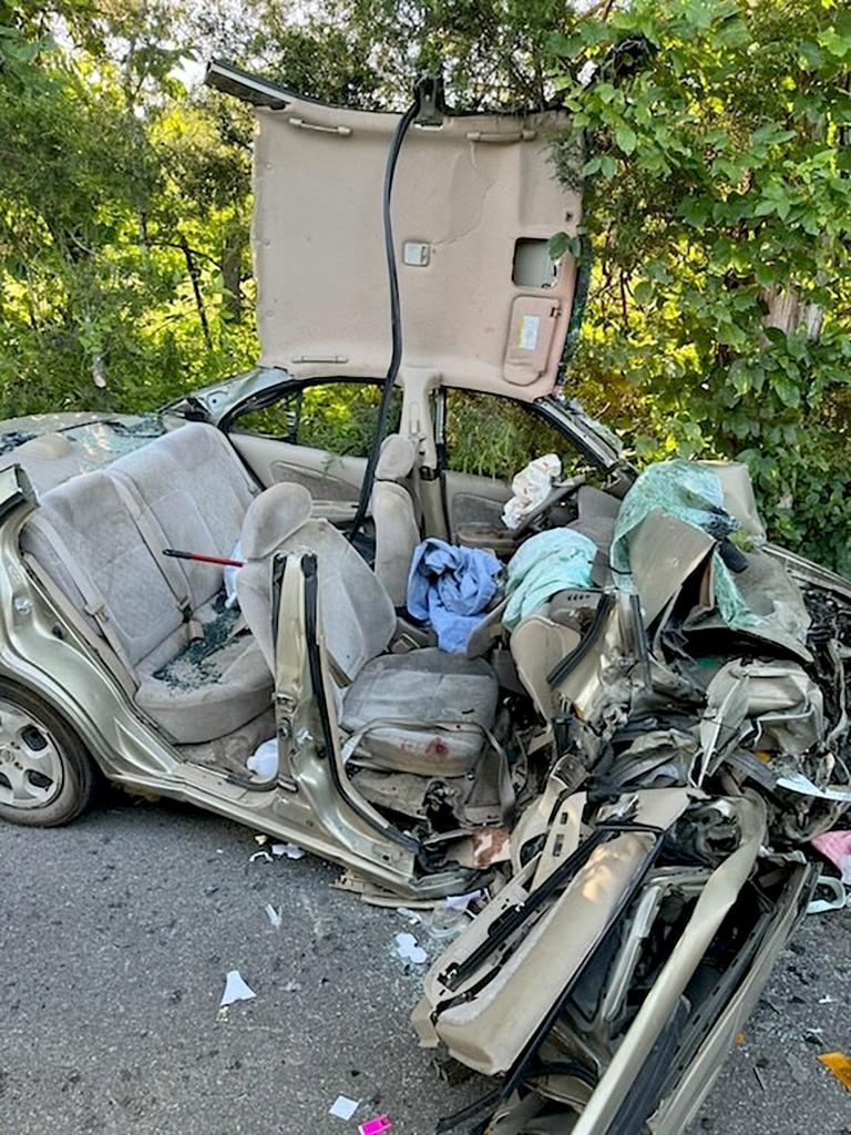 The couple's Nissan was completely destroyed in the crash.