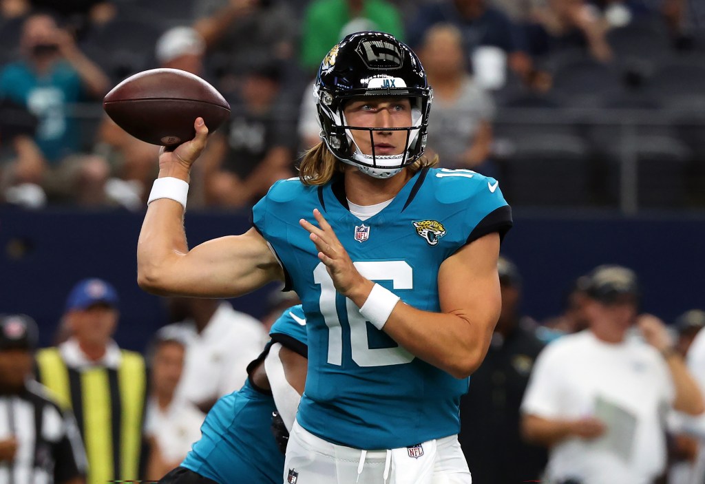 Trevor Lawrence #16 of the Jacksonville Jaguars passes the ball in the first quarter against the Dallas Cowboys in a preseason game at AT&T Stadium on August 12, 2023 in Arlington, Texas. 