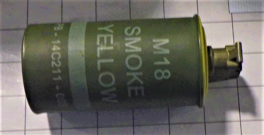 A short while later, agents found an active smoke grenade in a traveler's carry-on bag.