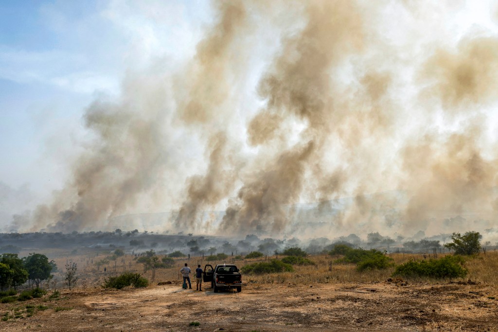 Smoke engulfs the air in the Golan Heights following a Hezbollah attack. 