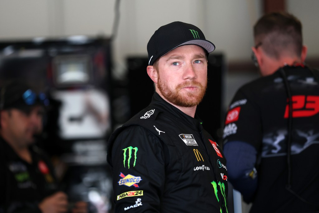 Tyler Reddick, driver of the #45 Monster Energy Toyota, looks on the garage area during practice for the NASCAR Cup Series Toyota/Save Mart 350 at Sonoma Raceway on June 07, 2024 in Sonoma, California. 