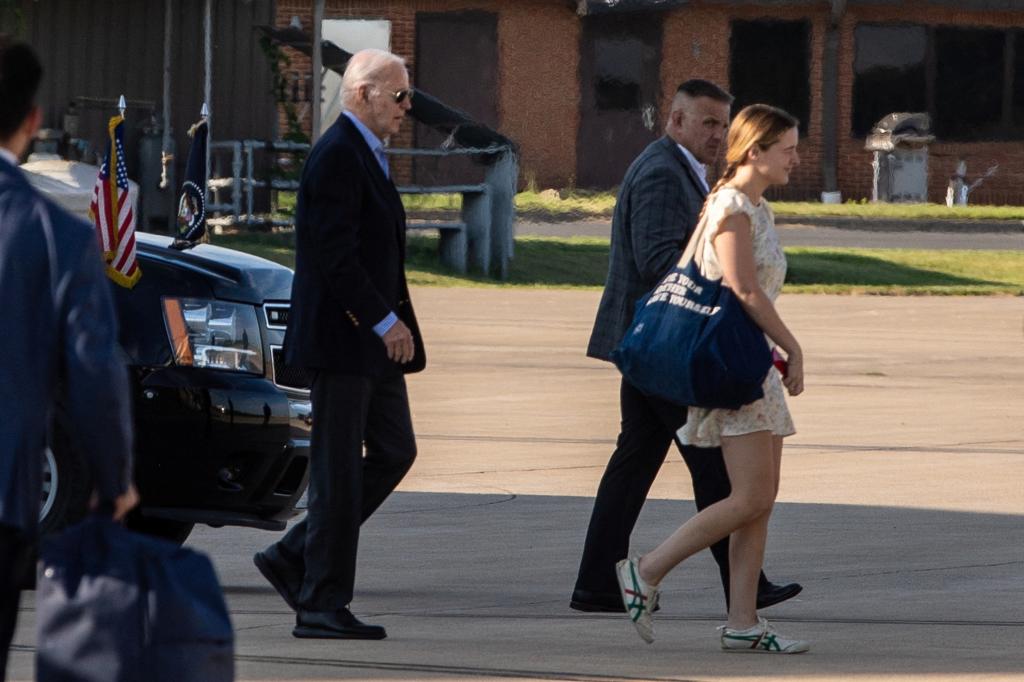 President Biden boarding Marine One with his granddaughter Finnegan in Delaware ahead of the president's trip to Italy for the G7 Summit on June 12, 2024. 