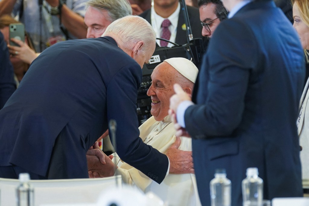 U.S. President Joe Biden shaking hands with Pope Francis at the G7 summit in Borgo Egnazia, Italy