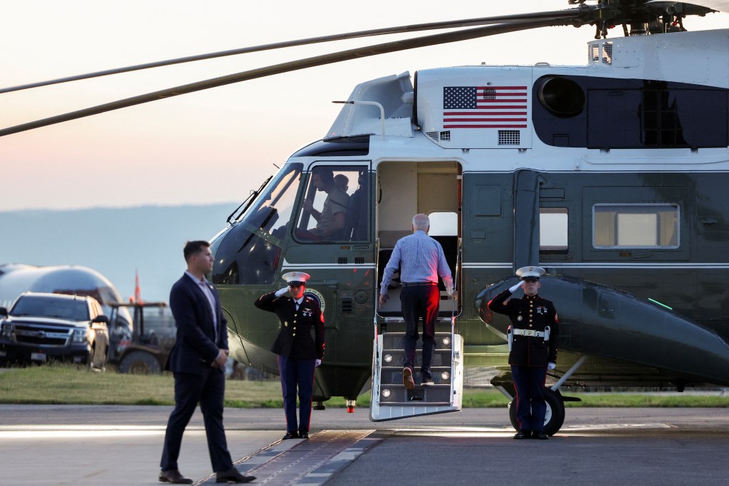 President Joe Biden boards Marine One en route to Camp David at Hagerstown Regional Airport in Hagerstown, Maryland, U.S. June 20, 2024.