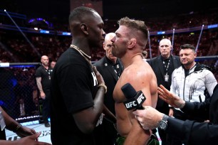  Israel Adesanya faces off against Dricus Du Plessis of South Africa during the UFC 290 event at T-Mobile Arena on July 08, 2023