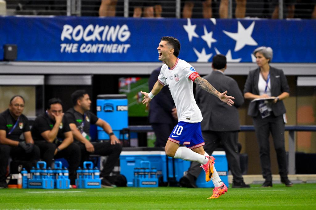 United States forward Christian Pulisic (10) celebrates after he scores a goal against Bolivia during the first half in a 2024 Copa America match on Sunday.