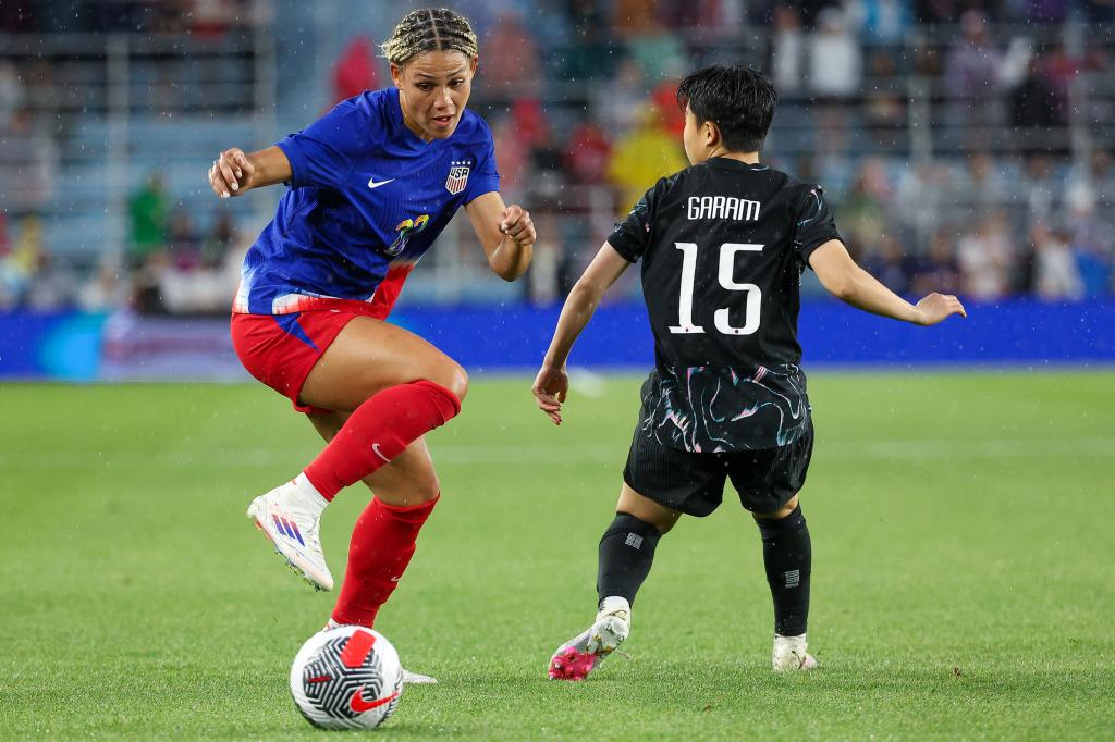 US Women's National Team defender Emily Fox (23) passing the ball during a soccer match against South Korea at Allianz Field, St. Paul, Minnesota