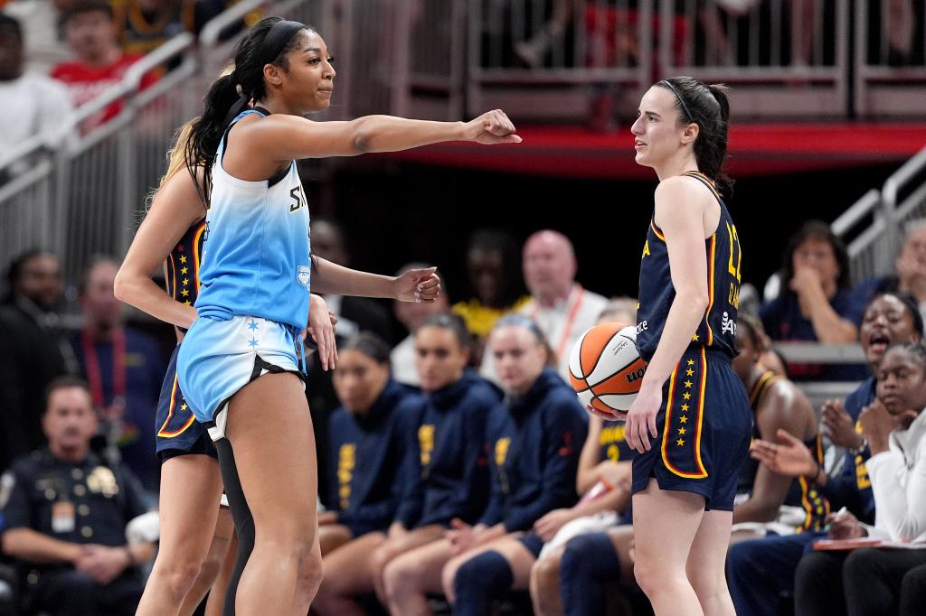 Angel Reese of the Chicago Sky reacting after fouling Caitlin Clark of the Indiana Fever during a basketball game at Gainbridge Fieldhouse
