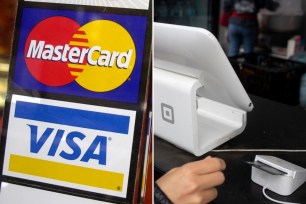 Visa and Mastercards and customer using credit card
