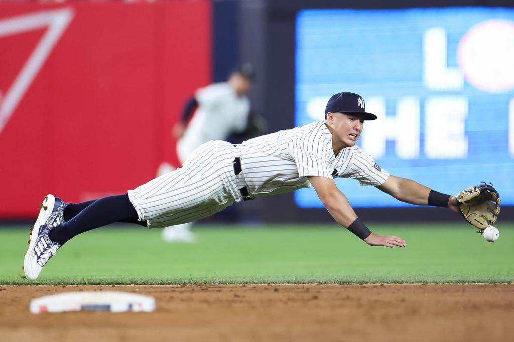 Anthony Volpe #11 of the New York Yankees fails to make a catch against the Baltimore Orioles during the ninth inning at Yankee Stadium on June 19, 2024 in the Bronx borough of New York City.