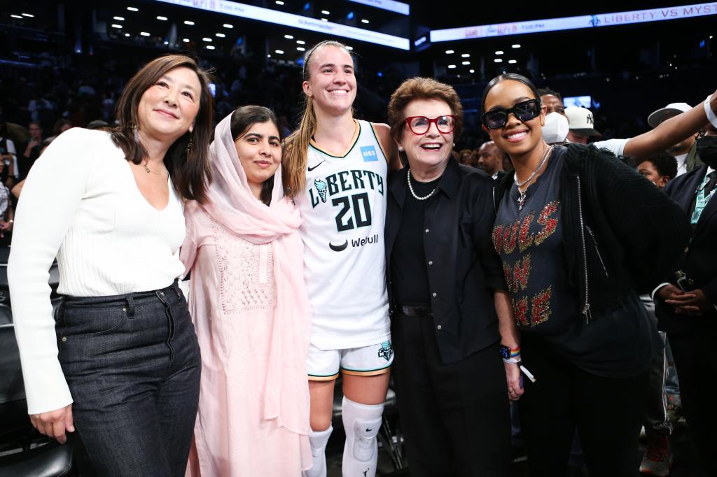 Clara Tsai, owner of the New York Liberty, Malala, Sabrina Ionescu #20, Billie Jean King and recording artist H.E.R. after Liberty win over the Washington Mystics for Round 1 Game 1 of the 2023 WNBA Playoffs at Barclays Center.