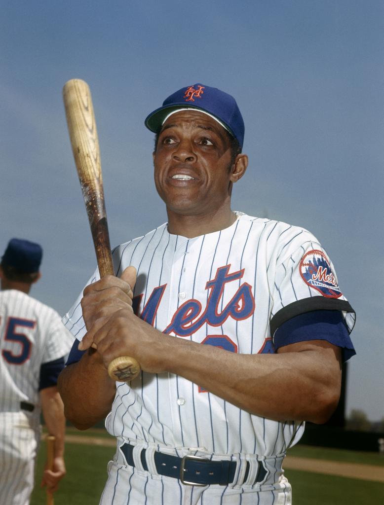 Willie Mays of the New York Mets holding a baseball bat for a portrait in 1973