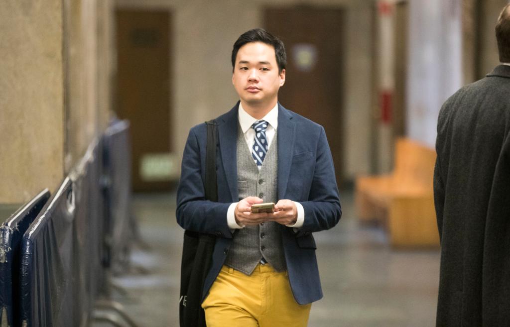 Winston Nguyen in the hallway at Manhattan Criminal Court. 