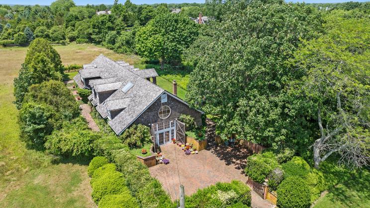 A former potato barn turned into the beloved home and workspace of renowned artists Karl Mann and Hector Leonardi has hit the market for $4.45 million after over three decades.