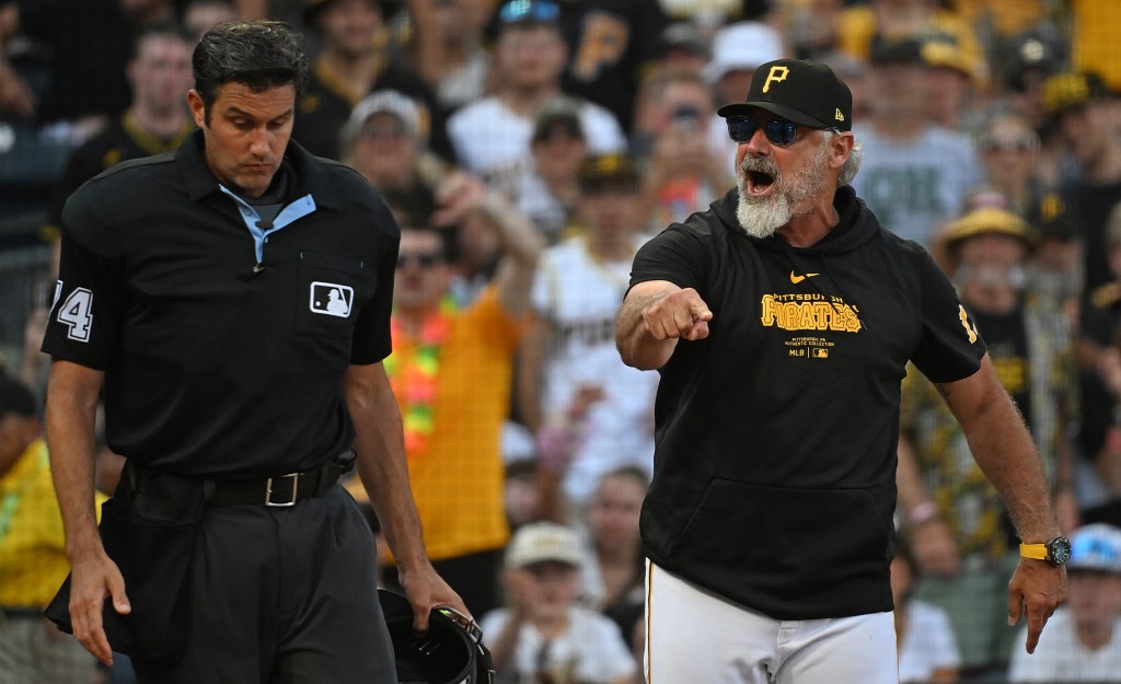 Derek Shelton of the Pittsburgh Pirates yells at home plate umpire John Tumpane after being ejected in the seventh inning.