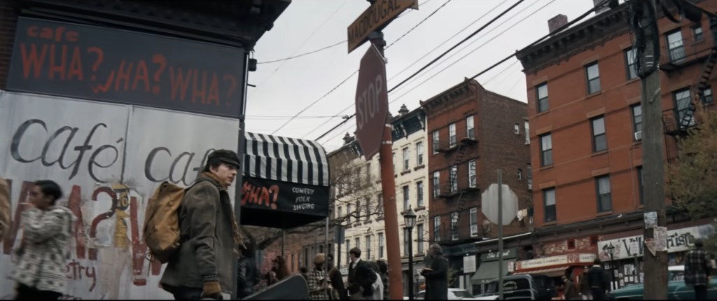 Timothee Chalamet standing on a street. 