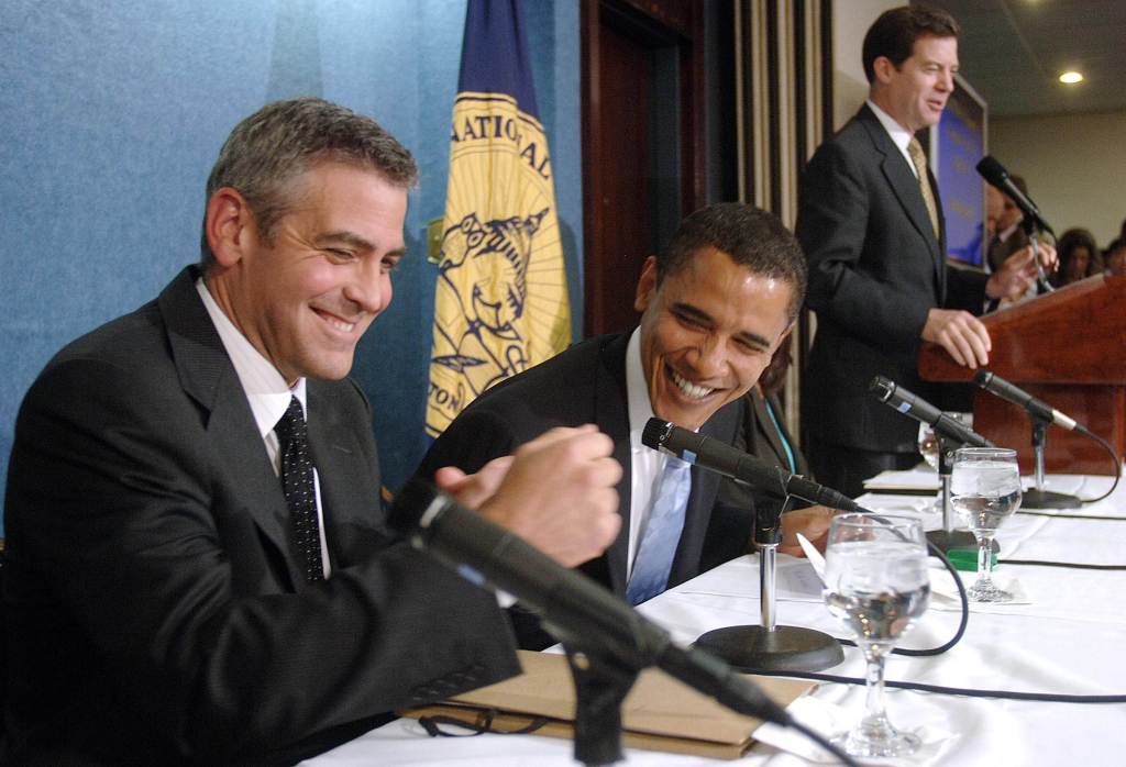 George Clooney and Barack Obama at a press conference.