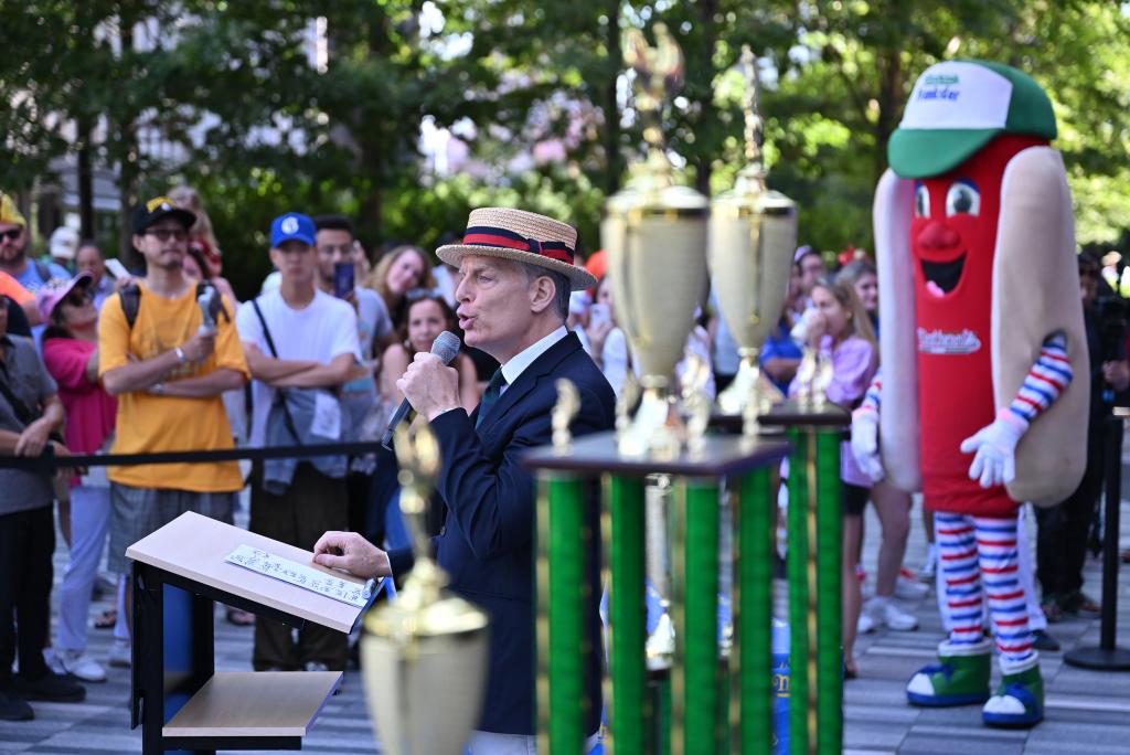 Event MC George Shea at the official weigh-in ceremony for Nathan's Famous Fourth of July International Hot Dog Eating Championship in Manhattan