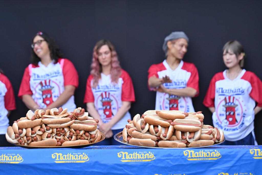 Miki Sudo and Nick Wehry at Nathan's Famous Fourth of July International Hot Dog Eating Championship's official weigh-in ceremony at Hudson Yards Plaza, Manhattan, with Joey Chestnut absent due to Impossible Foods sponsorship.
