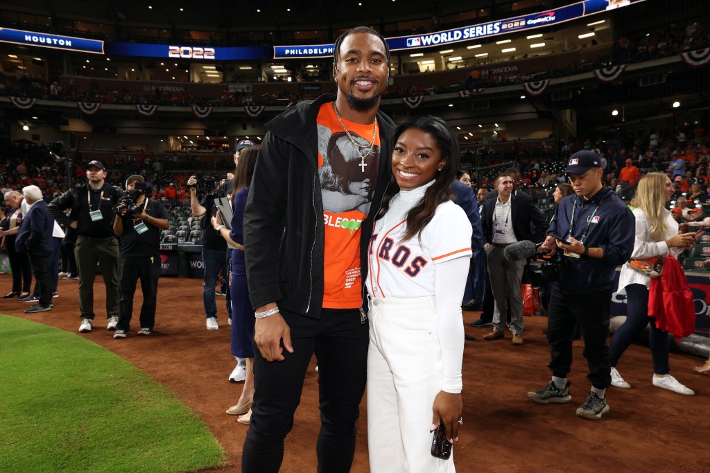 Jonathan Owens with Simone Biles. 