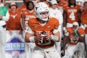 Texas Longhorns quarterback Arch Manning (16) looks to pass the ball during the second half against the Texas Tech Red Raiders at Darrell K Royal-Texas Memorial Stadium.