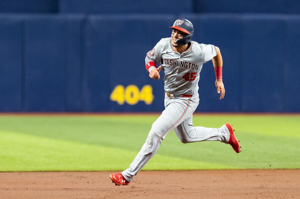 Washington Nationals first baseman Joey Meneses (45) runs to third base against the Tampa Bay Rays during the first inning at Tropicana Field. 