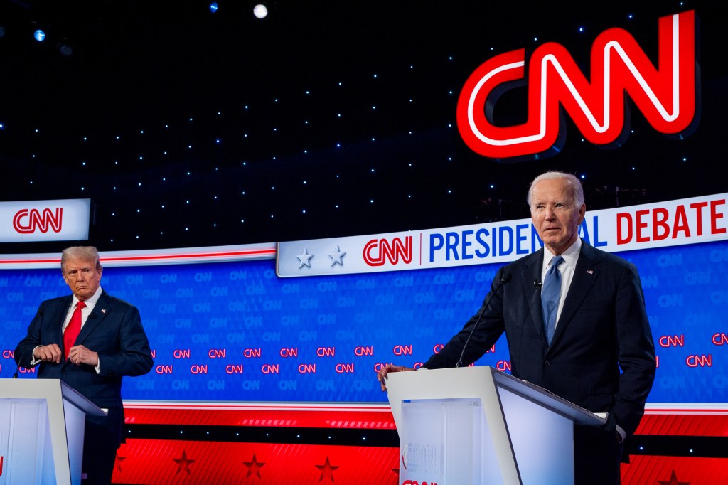 Republican presidential candidate, former President Donald Trump (L) looks at U.S. President Joe Biden during the CNN Presidential Debate at the CNN Studios on June 27, 2024 in Atlanta, Georgia.